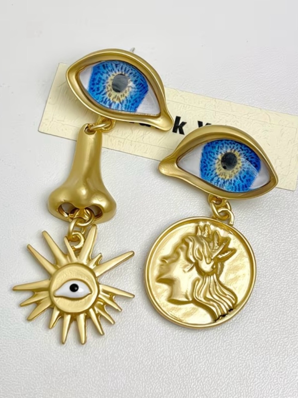 Schiaparelli Inspired Pale Gold Eye Drop Coin & Sun Dangle Earrings